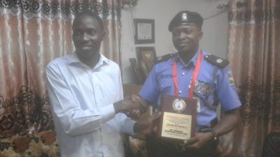 PHOTO NEWS: Presentation of a ‘Pillar of Peace and Security Award’ to SP Olayinka Egbeyemi