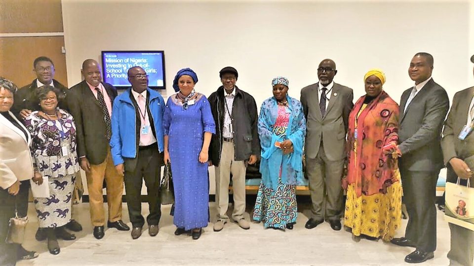 Dr.-Hajo-Sani-SSAP-and-representative-of-Mrs.-Aisha-Buhari-4th-from-right-along-with-other-delegates-at-the-event..jpg