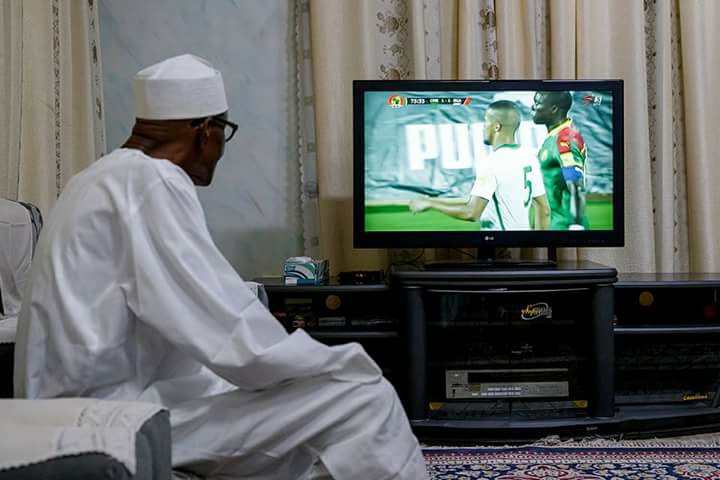 Buhari-watches-Nigeria-Cameroon-match.jpg