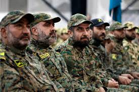 Fighters-listen-to-Hezbollah-leader-Sheikh-Hassan-Nasrallah-as-he-speeaks-via-a-video-link-Beirut-Lebanon-November-11-2015-AP-phto-by-Bilal-Hussein.jpg