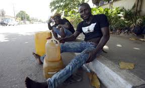 Nigerians give Buhari nod to deal with oil marketers causing artificial fuel scarcity