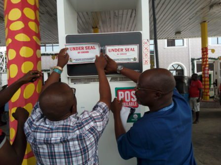 DPR-officials-sealing-petrol-station-in-Warri-–-photo-NAN-448x336.jpg