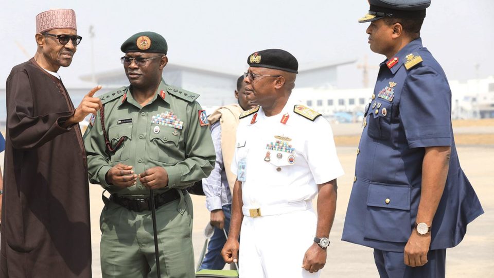 Buhari-speaking-to-service-chiefs-before-leaving-for-a-10-day-leave-last-year.jpg