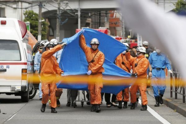 Rescue-workers-at-the-scene-of-the-mass-stabbing-at-a-bus-stop-in-Greater-Tokyo-e1559023104708.jpg