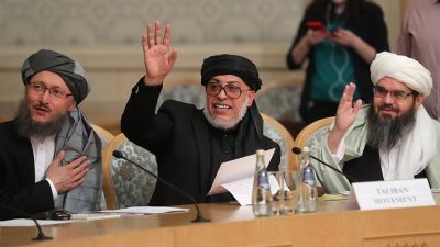 Afghan govt opens talks on peaceful transfer of power, as Taliban troops surround nation’s capital Kabul