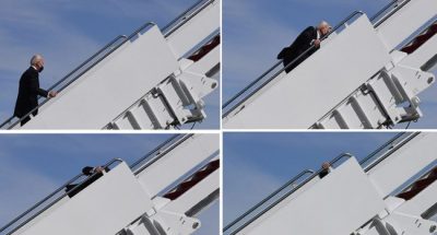 US President Joe Biden stumbles as he boards Air Force One