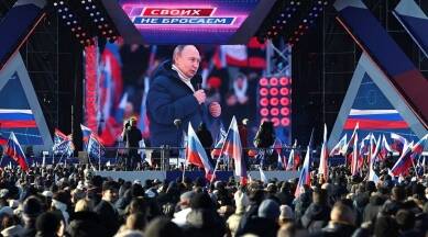 Russia will implement all plans in Ukraine, Putin tells stadium event in Moscow