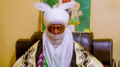 President Buhari cheers, as Emir of Kano Senegal confers highest award on Emir of Kano