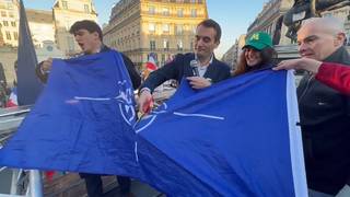 NATO flag defaced as ‘thousands’ rally in Paris